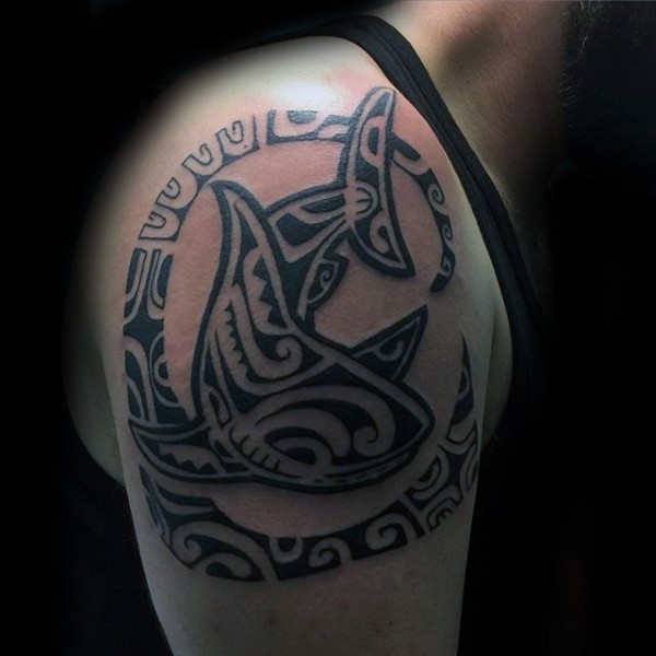 Unusual designed black ink shoulder tattoo of shark stylized with Polynesian ornaments