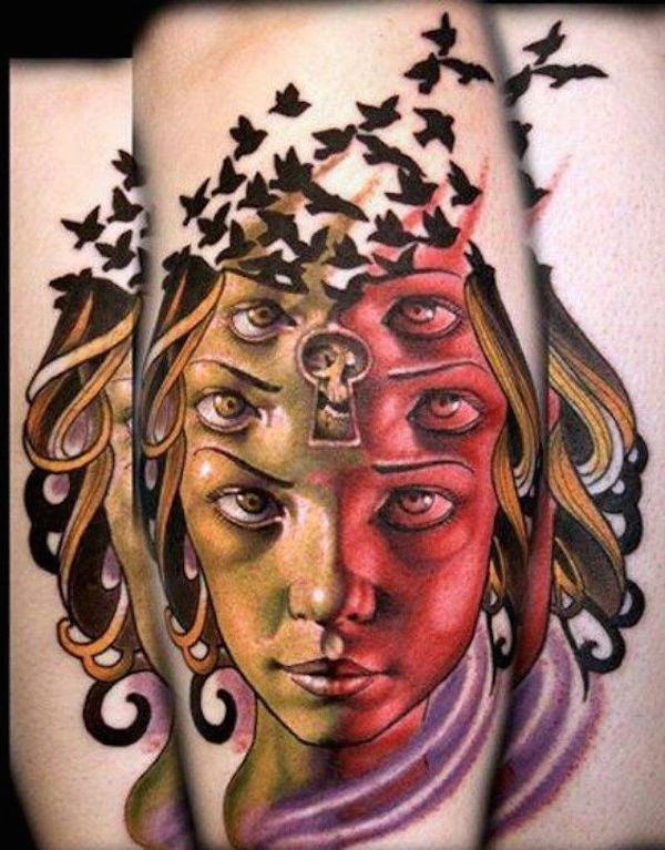 Unusual designed colored mystical woman tattoo combined with black birds