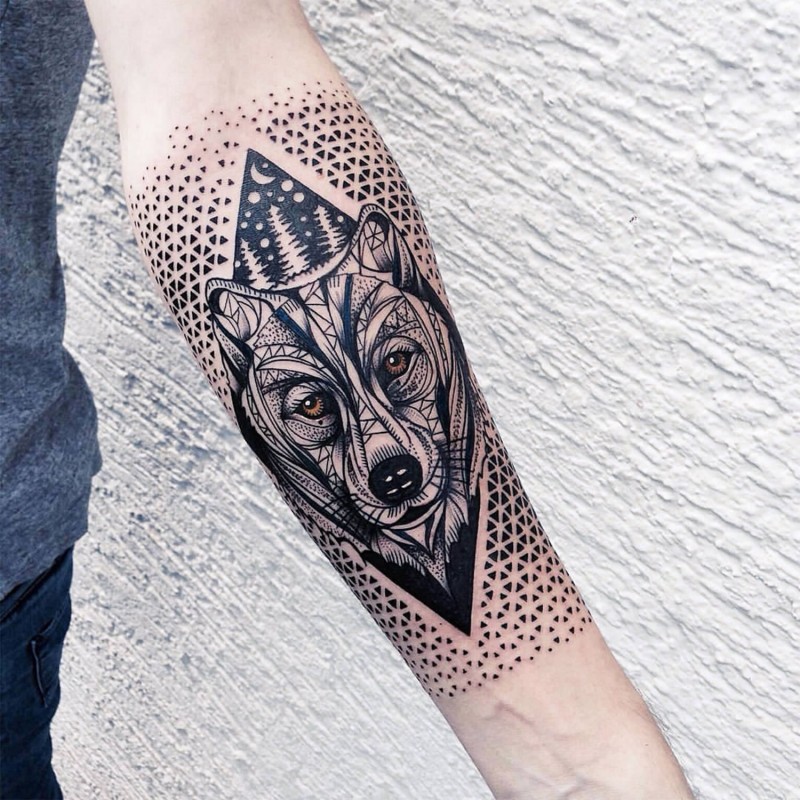 Unusual designed colored wolf face tattoo combined with geometrical figure and moon