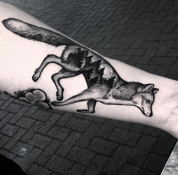 Unusual dot style arm tattoo of wolf stylized with creative night forest with moon