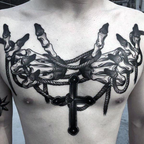Unusual looking colored chest tattoo of one hands with rope and cross
