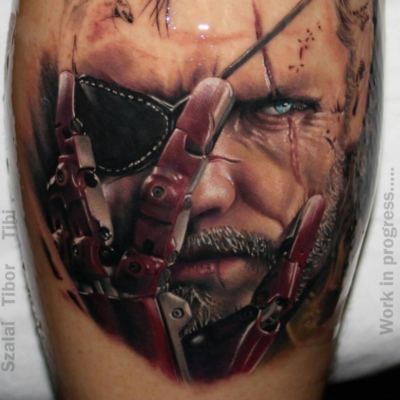 Unusual looking shoulder tattoo of creepy man with iron hand