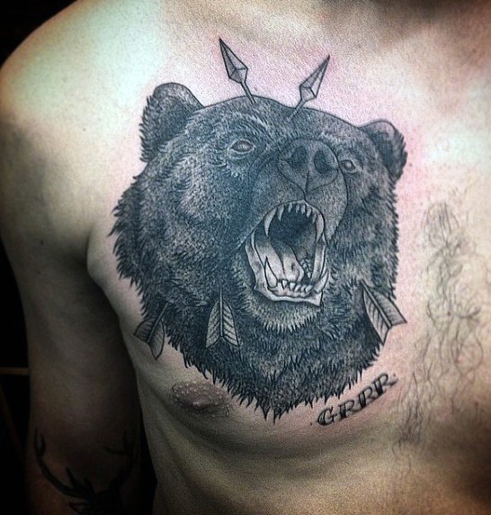 Unusual painted black ink roaring bear with arrows in head and lettering tattoo on chest
