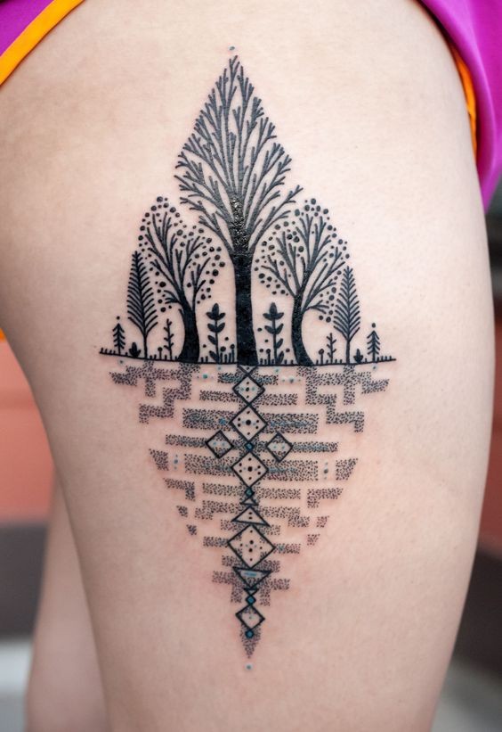 Unusual painted black ink trees tattoo on thigh with geometrical ornaments