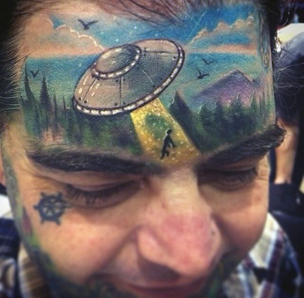 Unusual places colored alien ship with human tattoo on forehead