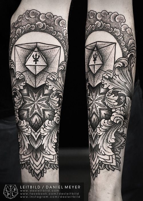 Unusual style black ink floral tattoo with geometrical figure on arm