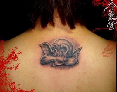 Unusual style combined angel skeleton tattoo on upper back