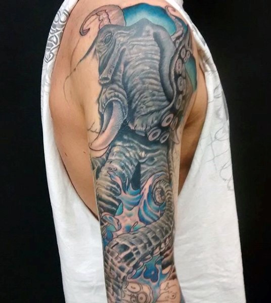 Unusual style multicolored half elephant half octopus tattoo on arm