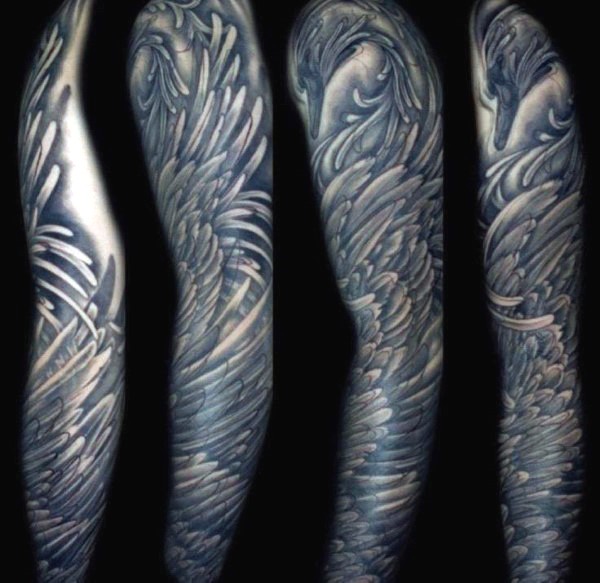 Unusual style painted and colored massive feather wing tattoo on sleeve