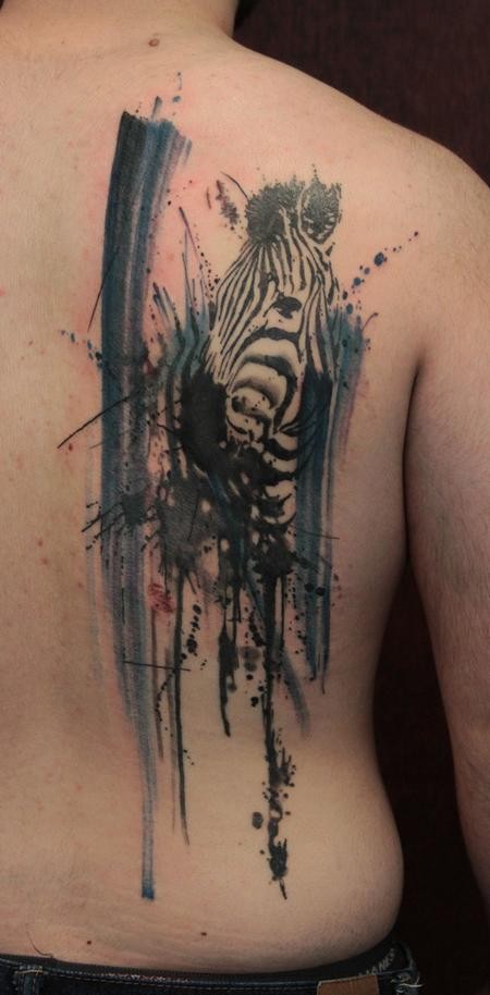 Unusual style painted big colored abstract zebra tattoo on shoulder