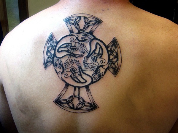 Unusual tattoo on back in irish style