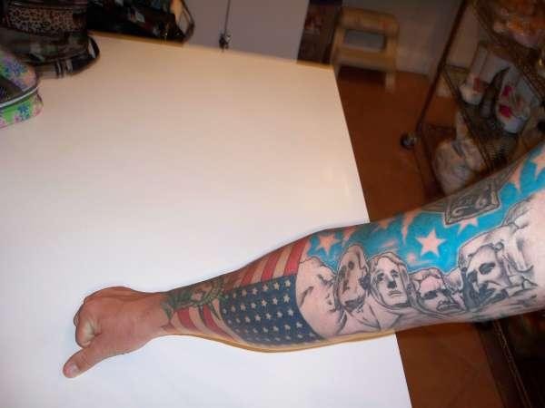 Usa flag and famous us presidents tattoo on arm