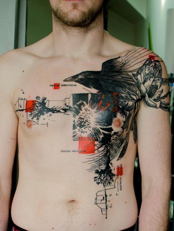 Usual big black ink crow tattoo on chest stylized with red squares and lettering