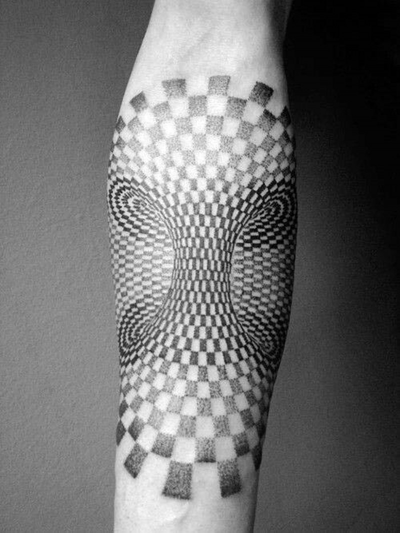 Usual black and white hypnotic ornament tattoo on arm