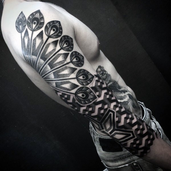 Usual designed black ink ornamental tattoo on sleeve