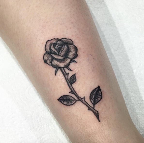 Usual painted black ink little tattoo of rose flower