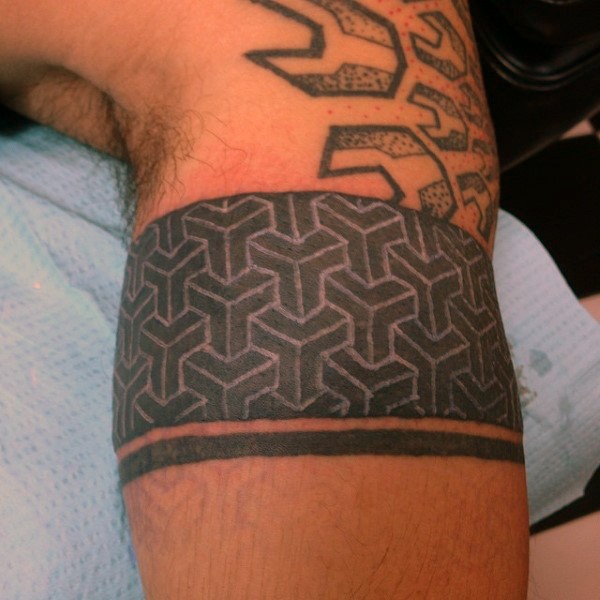 Usual style black and white geometrical ornaments tattoo on arm