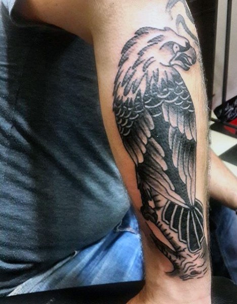 Usual style painted big black and white eagle tattoo on arm
