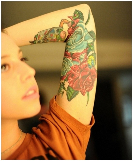 Usual style painted colored roses tattoo on sleeve