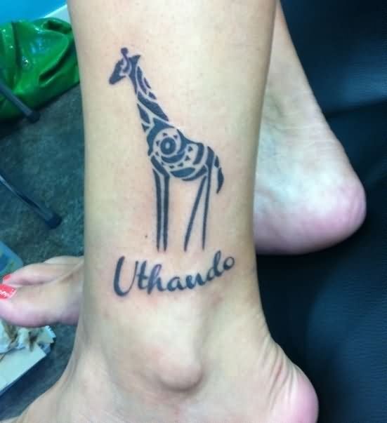 Uthando giraffe tattoo on ankle