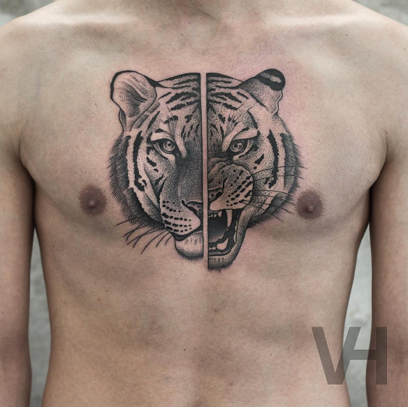 Valentin Hirsch symmetrical inspired chest tattoo of steady and angry tigers