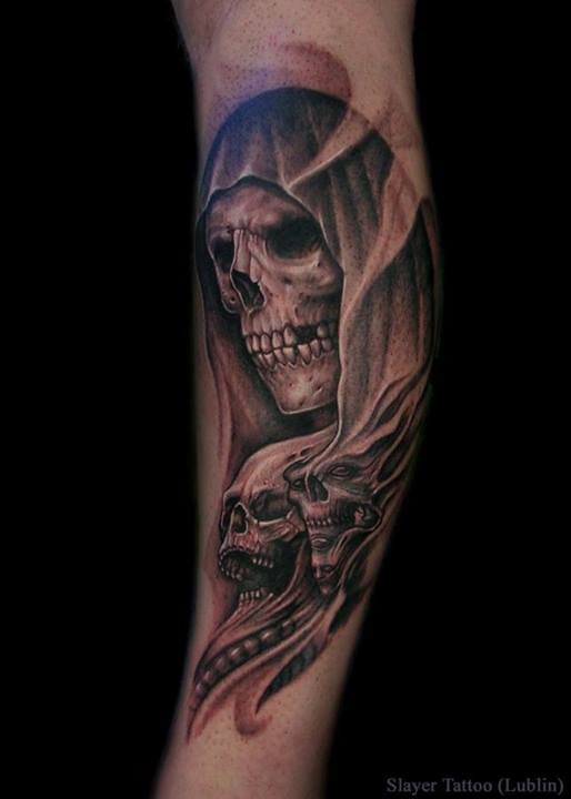 Various mystical black ink skulls tattoo on arm