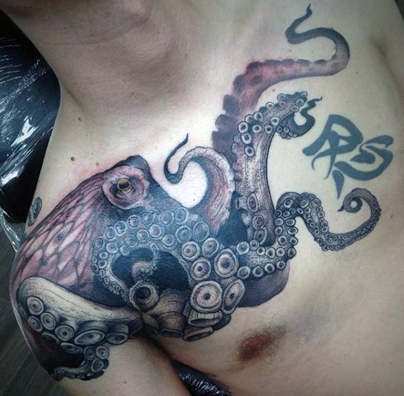 Very beautiful painted and detailed big octopus tattoo on chest