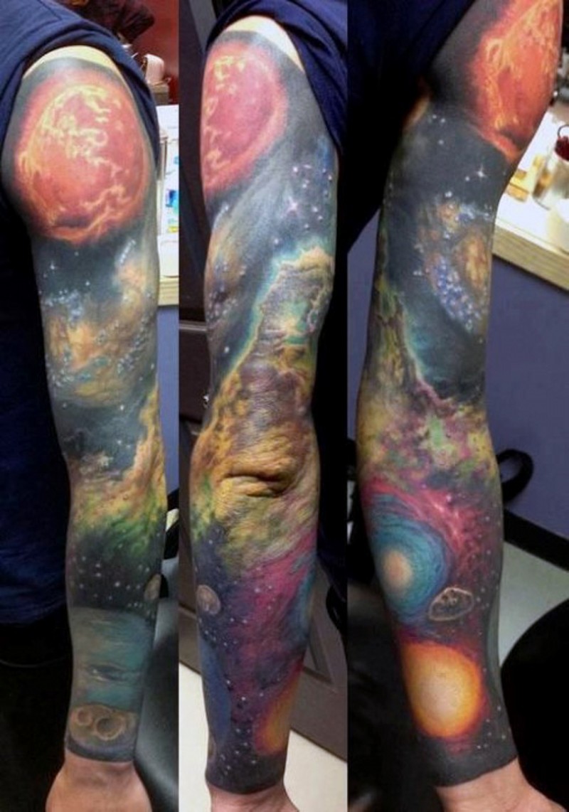 Very beautiful painted colorful deep space tattoo on sleeve