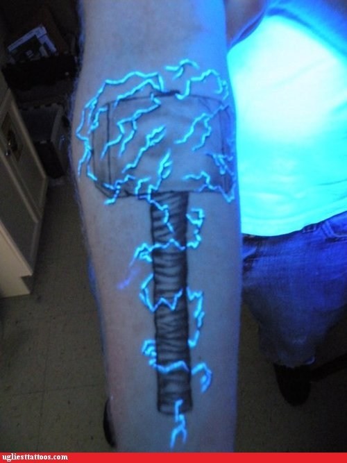 Very cool black light hammer of thor tattoo