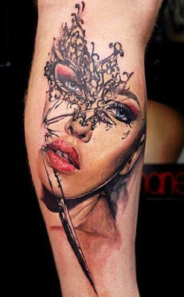 Very detailed and colored leg tattoo of gorgeous woman with mask