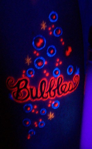 Very interesting black light bubbles tattoo