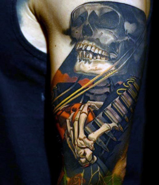 Very nice detailed and colored big skeleton with guitar tattoo on arm