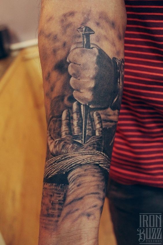 Very realistic Christian style dramatic black and white tattoo on sleeve