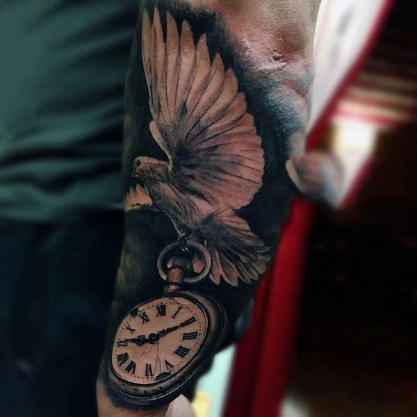 Very realistic looking black and white pigeon with broken pocket clock tattoo on arm