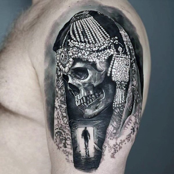 Very realistic looking black and white skeleton woman tattoo on arm top