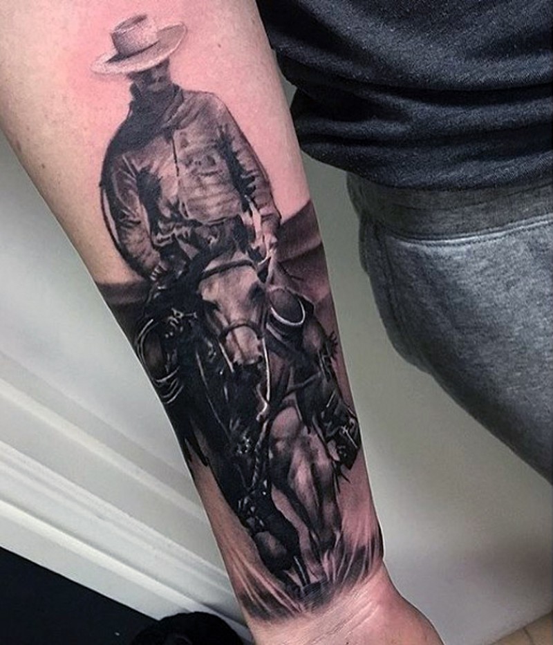 Very realistic looking black and white western cowboy tattoo on wrist