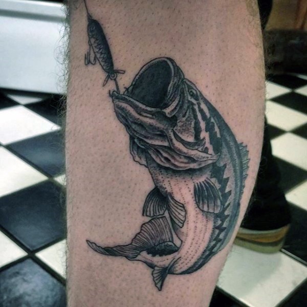 Very realistic looking black and white big hooked fish tattoo on leg