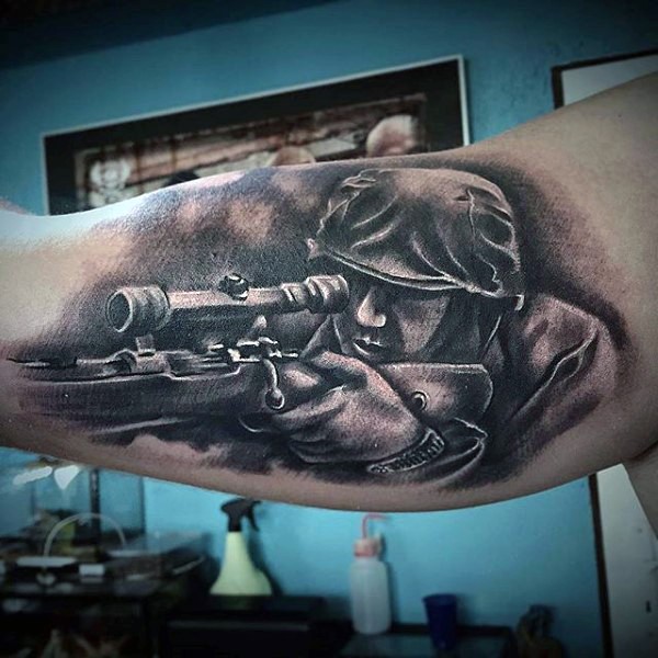 Very realistic looking black and white WW2 sniper tattoo on arm