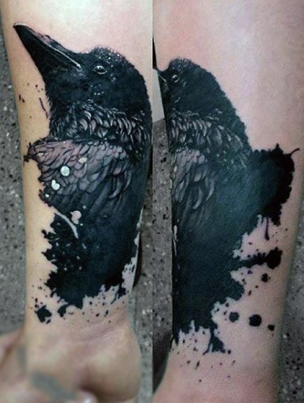 Very realistic looking black ink crow tattoo on wrist