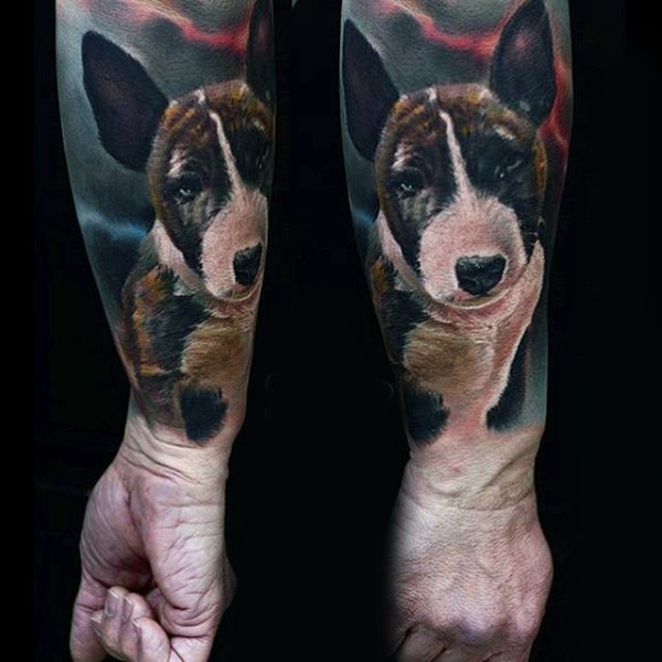 Very realistic looking colored real dog portrait tattoo on wrist