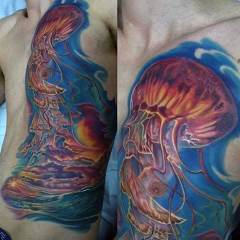 Very realistic looking colorful jellyfish tattoo on chest