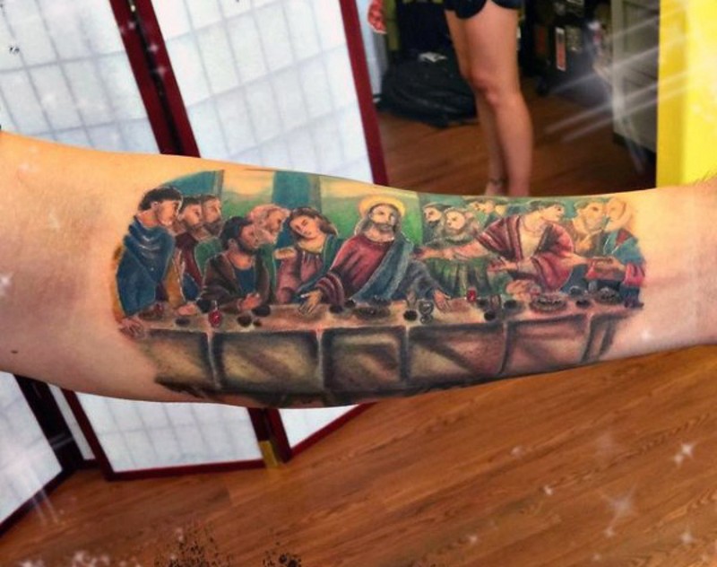 Very realistic looking multicolored Lord&quots Supper picture tattoo on arm