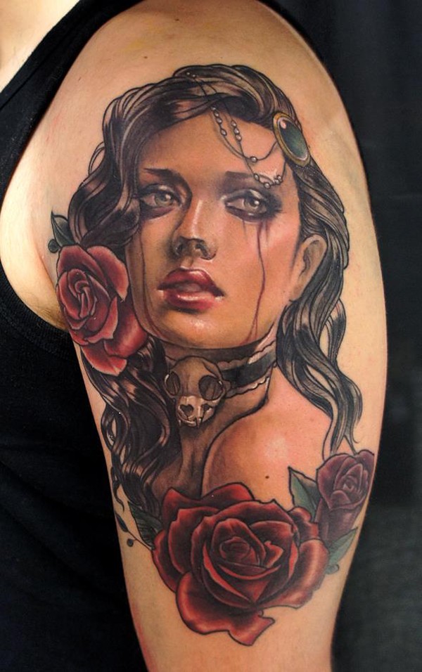 Very realistic painted colored crying gypsy woman with flowers tattoo on shoulder