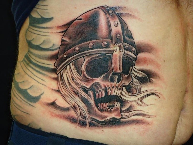 Viking skull in a helmet tattoo