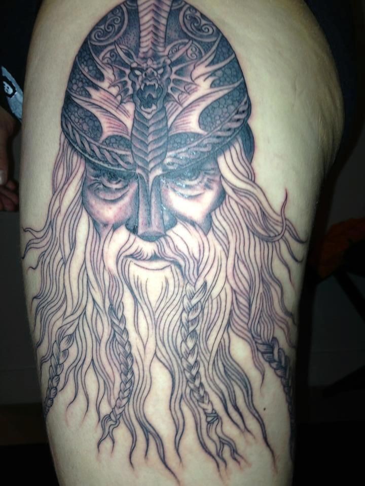 Viking with a long beard tattoo