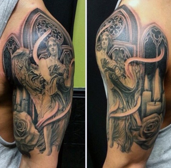 Vintage painting like black and white statue tattoo on shoulder with candle and flowers