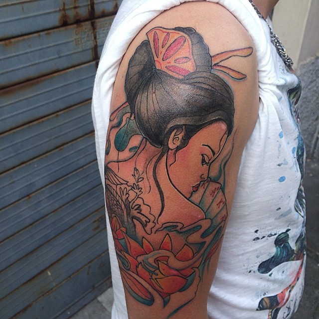 Vintage painting like colored Asian geisha tattoo on shoulder with playing cards