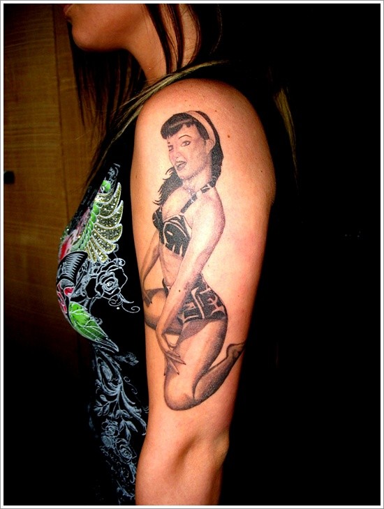 Vintage photo like detailed woman shoulder length tattoo
