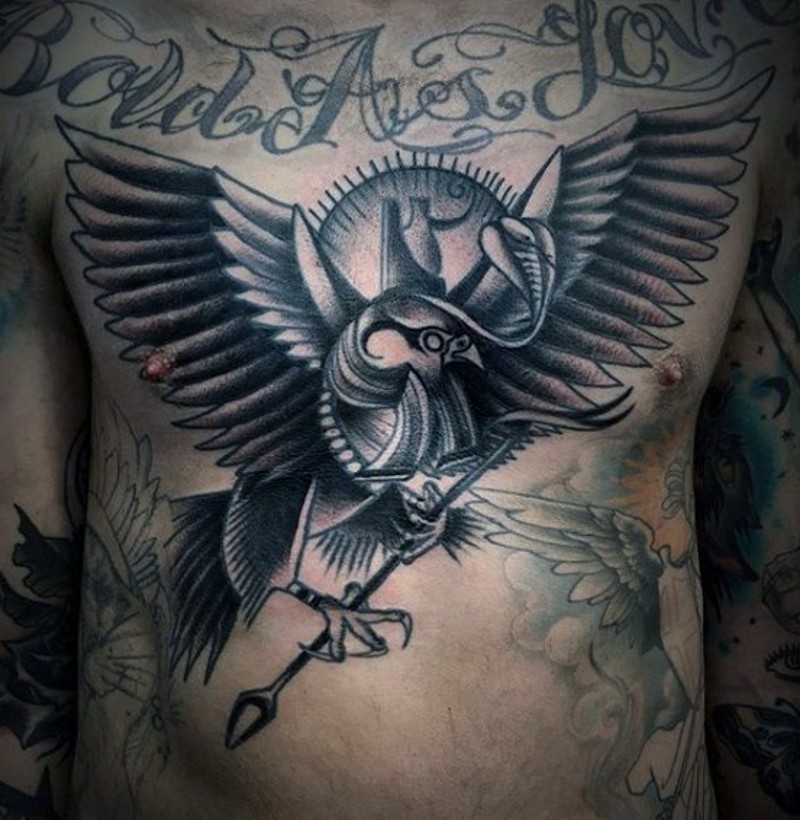 Vintage style black and white eagle with arrow tattoo on chest