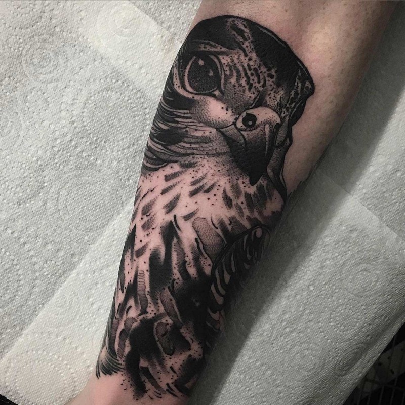 Vintage style black and white forearm tattoo of detailed eagle